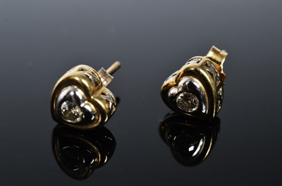 Lot 192 - A pair of 9ct gold diamond set ear studs