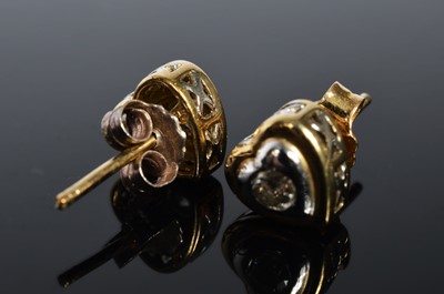 Lot 192 - A pair of 9ct gold diamond set ear studs
