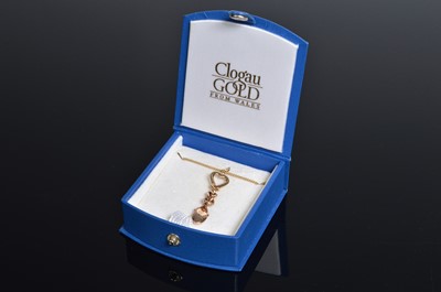 Lot 204 - A Clogau Welsh gold hallmarked love spoon on chain