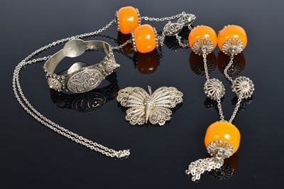 Lot 209 - A North African white metal bangle