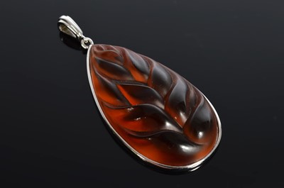 Lot 212 - A Lalique glass and silver Heliconia pendant