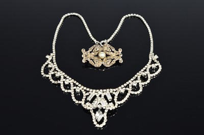 Lot 238 - A marcasite and pearl brooch