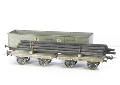 Lot 1079 - Carette for Bassett-Lowke Gauge 2 Litho British-Outline Eight-Wheel Freight Stock