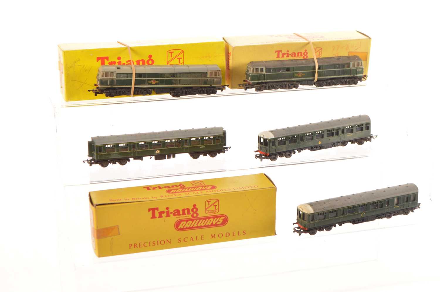 Lot 11 - Tri-ang TT Gauge mainly boxed BR green DMU 3-Car Set and pair of AIA AIA Diesel Locomotives (5)