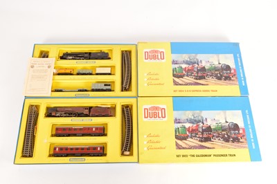 Lot 37 - Hornby-Dublo 00 Gauge boxed 2-Rail Passenger and Goods Train Sets (2)