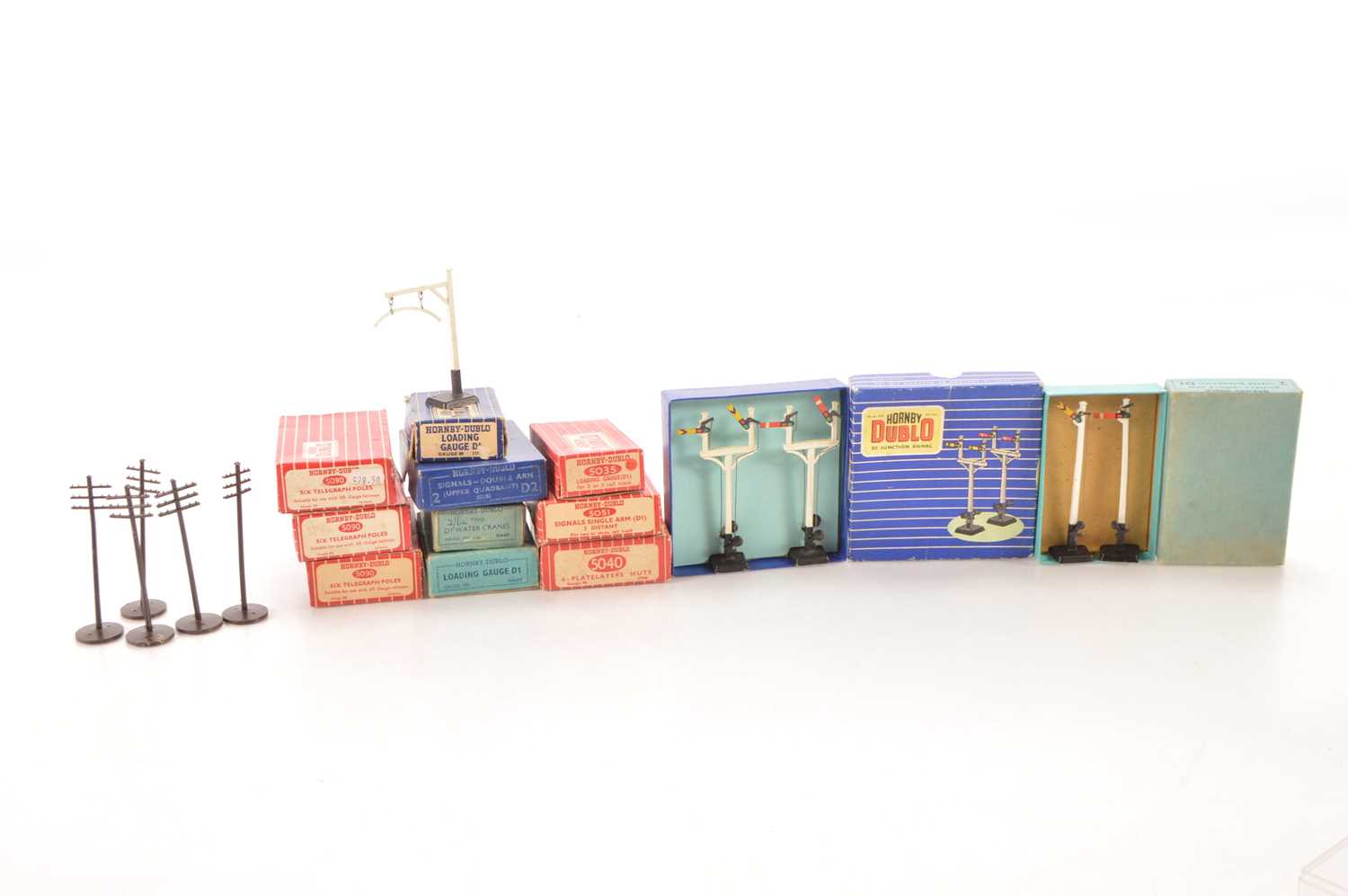 Lot 90 - Hornby-Dublo 00 Gauge 2 and 3-Rail boxed Lineside Accessories including Telegraph Poles Signals and other items (12 boxes and five loose poles)