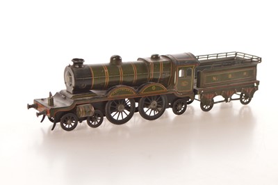 Lot 304 - Carette tinplate NBR lined green  902 4-4-2  'Highland Chief' Locomotive and Tender clockwork floor train