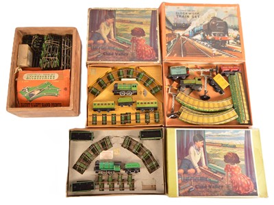 Lot 305 - Three Chad Valley Clockwork Train Sets (3)