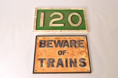 Lot 320 - Cast Iron Beware of The Trains Notice and Distance Marker (2)
