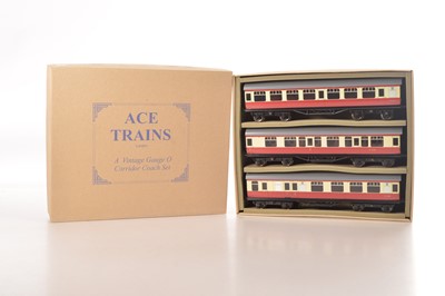 Lot 568 - Ace 0 Gauge Modern issue C/5 BR Blood and Custard 3-car set B