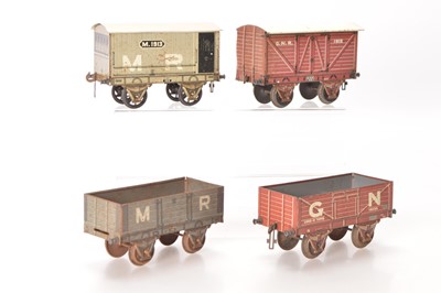Lot 719 - Carette Gauge 1 group of Pre 1st world war tinprinted Goods wagons (4)