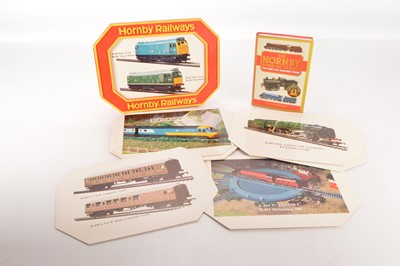 Lot 181 - Hornby (China) 00 Gauge boxed 1980's red and yellow plastic Shop counter Display and Hornby Book (2)