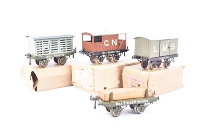 Lot 110 - Hornby 0 Gauge early Goods wagons with open axles and wagon type on solebars