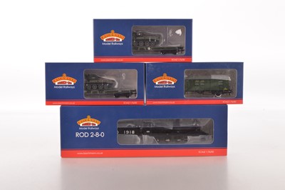 Lot 297 - Bachmann 00 gauge boxed War Department ROD Locomotive and Tender and military Tank Transporter wagons and SR Van (4)