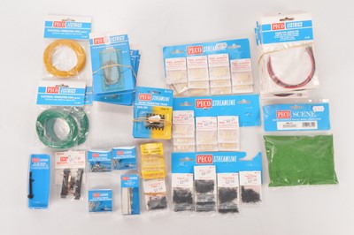 Lot 402 - Ex Shop Stock Peco Electrics pack mostly 00 Gauge Electrical and other accessories in original packaging (75+)