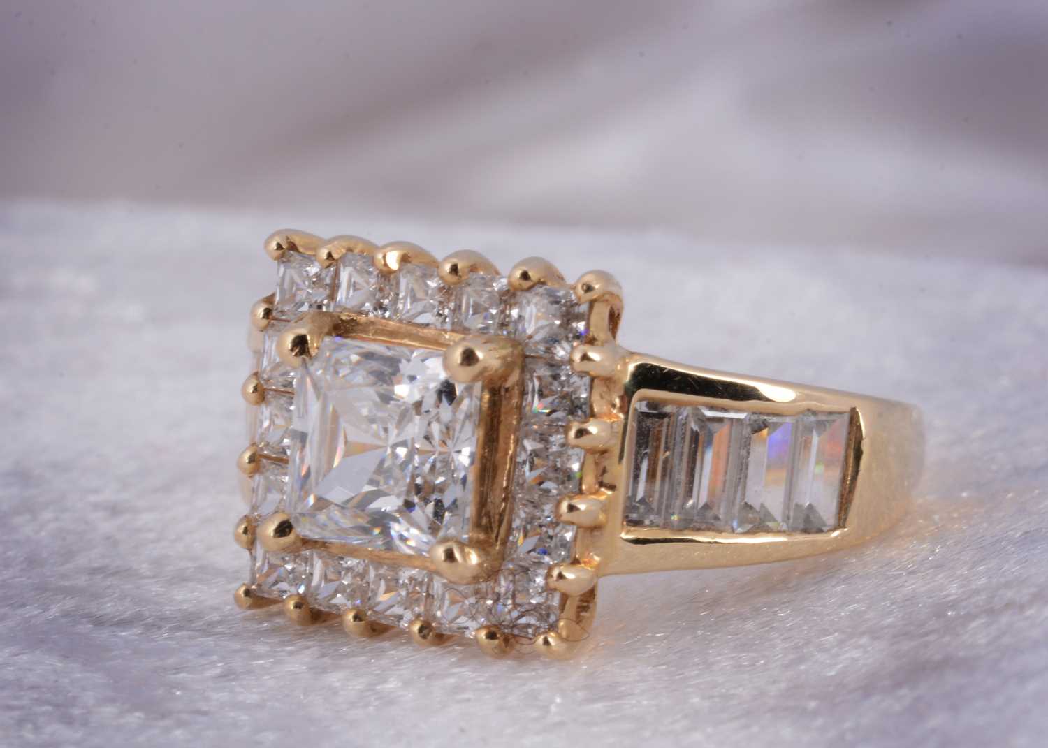 Lot 11 - A 14ct gold gem set dress ring