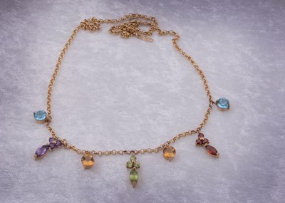 Lot 15 - A yellow metal QVC multi gem set fringe necklace