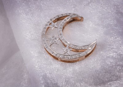 Lot 16 - A 9ct gold crescent moon and star gem set pendant