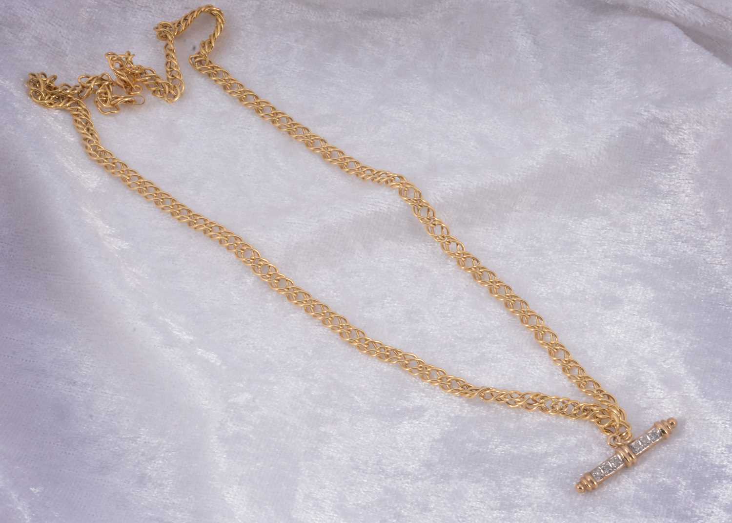 Lot 22 - A 9ct gold diamond set watch chain style necklace