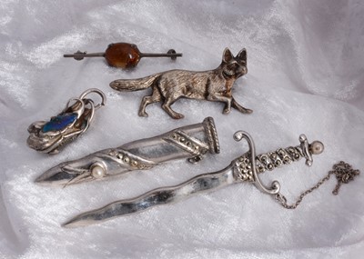 Lot 32 - A silver marcasite and simulated pearl sword brooch