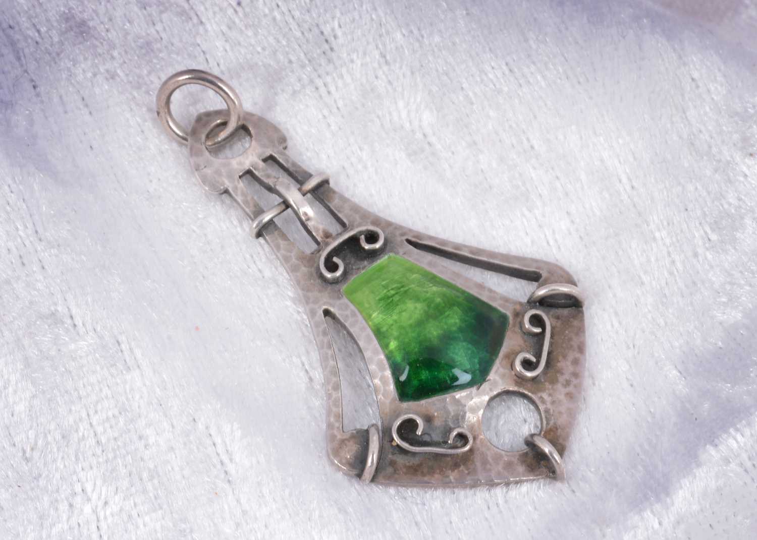 Lot 37 - An Edwardian art nouveau silver and enamel drop pendant
