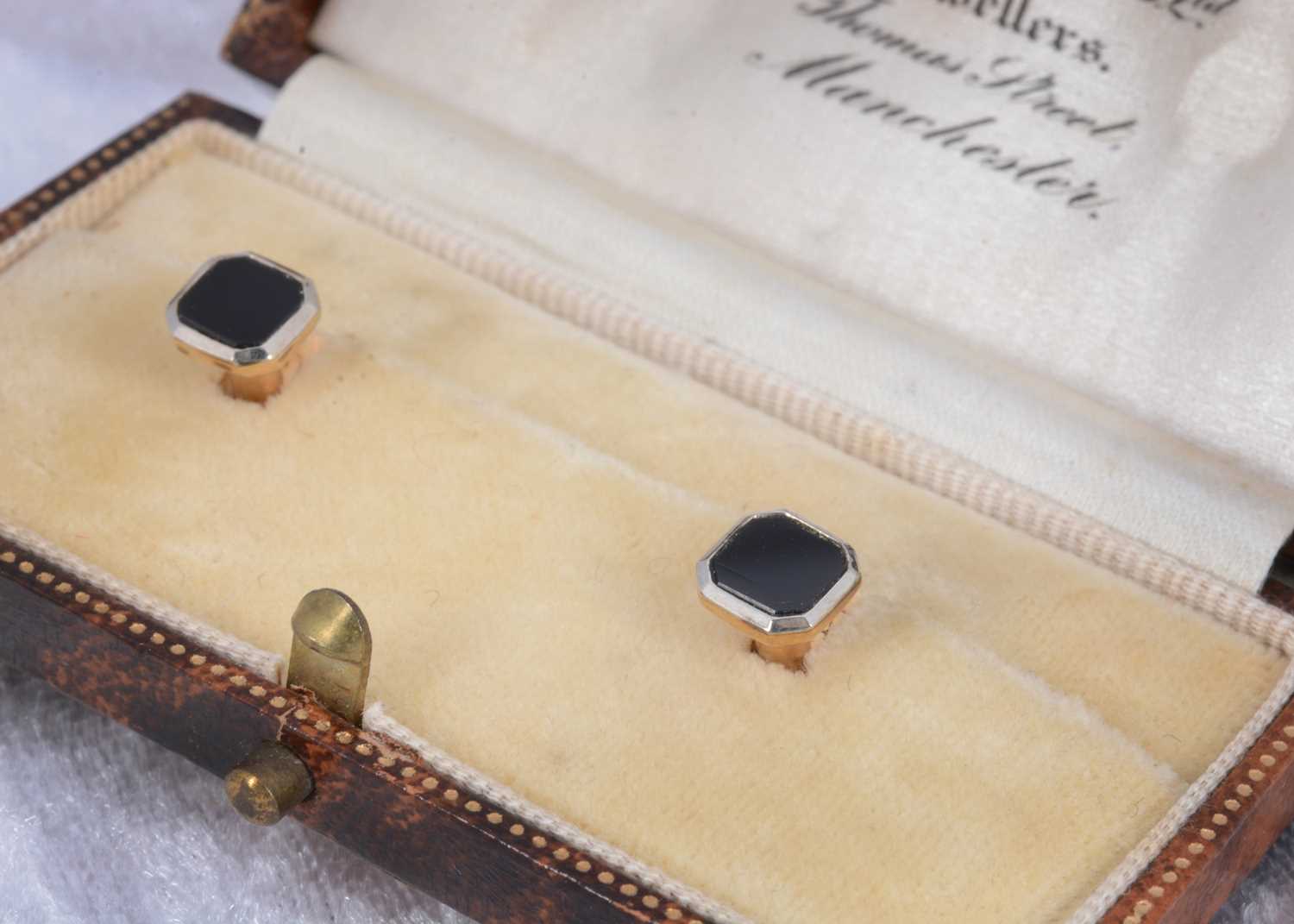 Lot 39 - A pair of 9ct gold and onyx dress studs