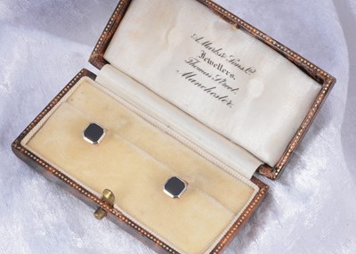 Lot 39 - A pair of 9ct gold and onyx dress studs