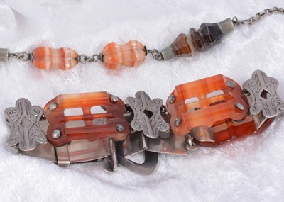 Lot 41 - A silver and carnelian belt and buckle style Scottish bracelet