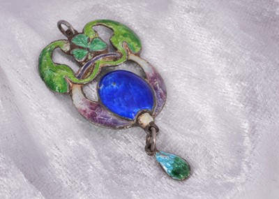 Lot 46 - An arts and crafts silver and enamel clover decorated pendant