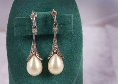 Lot 50 - A pair of silver earrings
