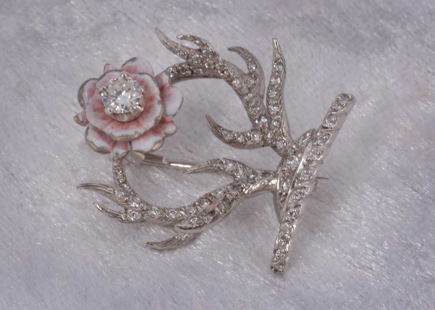 Lot 53 - A Wadham crest diamond enamel set brooch