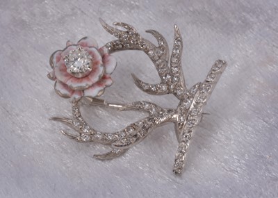 Lot 53 - A Wadham crest diamond enamel set brooch