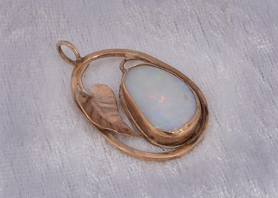 Lot 55 - A 9ct gold opal set ovoid pendant