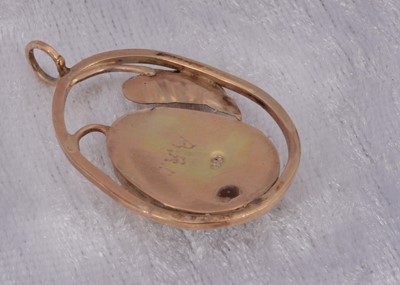 Lot 55 - A 9ct gold opal set ovoid pendant