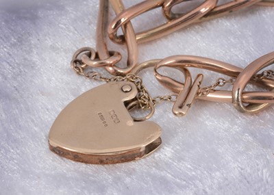 Lot 60 - A 9ct gold curb linked padlock clasp bracelet