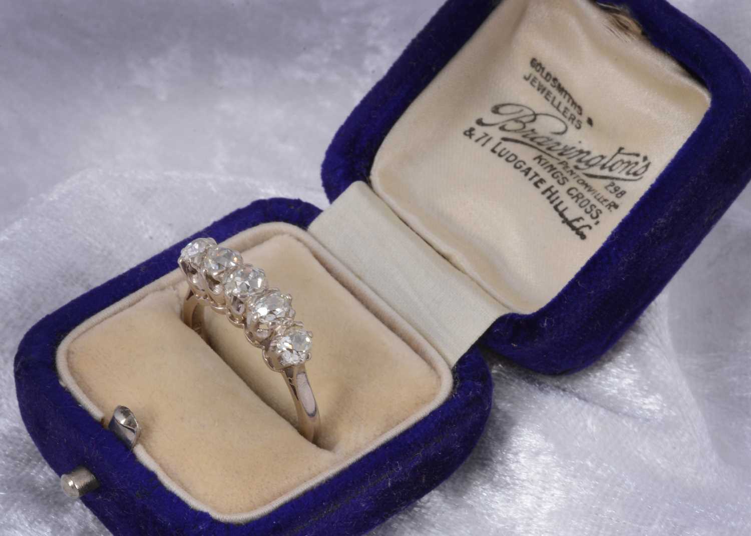 Lot 69 - A five stone 18ct gold dress ring