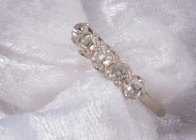 Lot 69 - A five stone 18ct gold dress ring