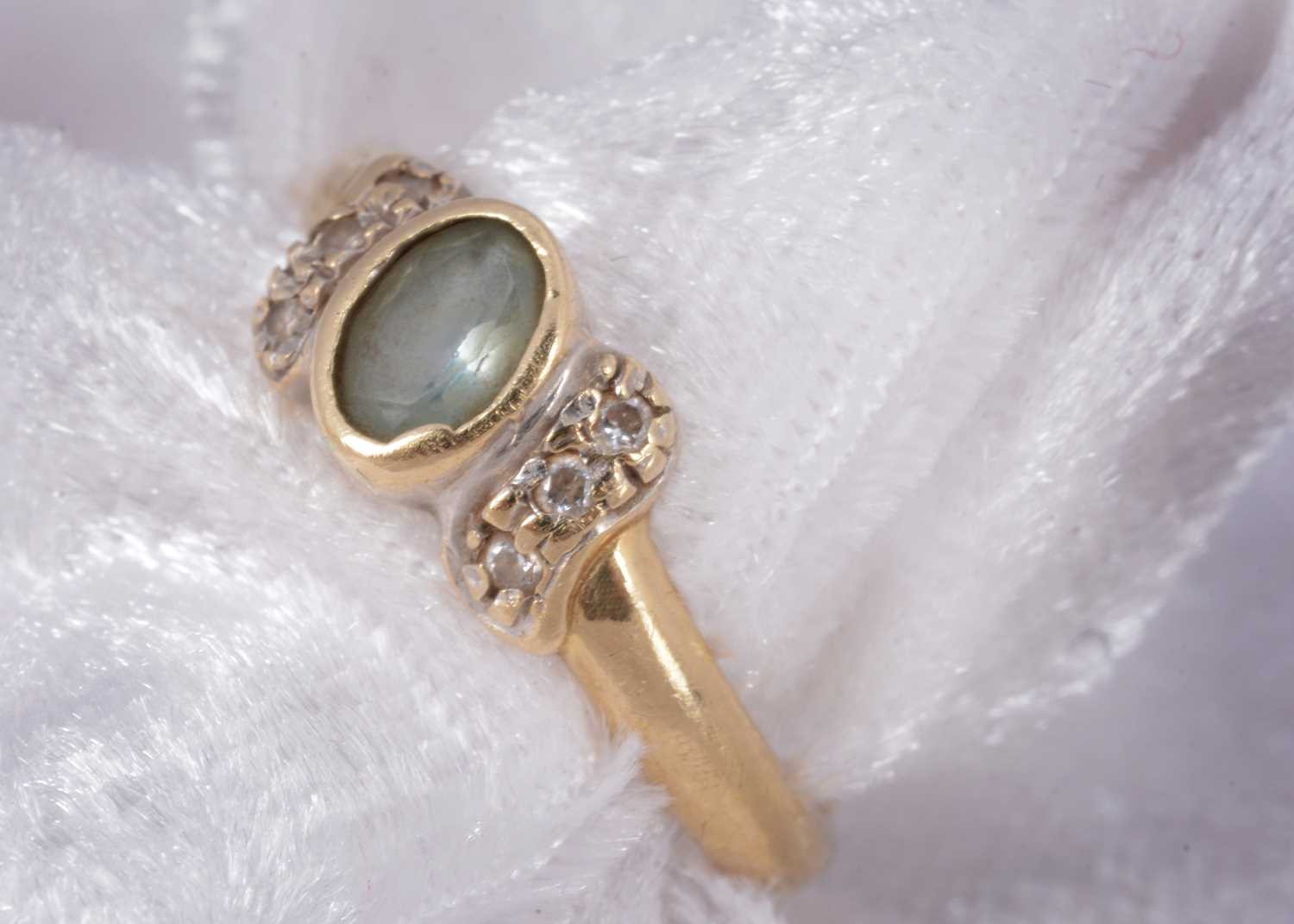 Lot 72 - A 14ct gold aquamarine and diamond dress ring