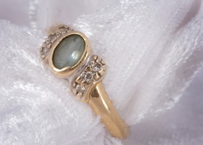 Lot 72 - A 14ct gold aquamarine and diamond dress ring