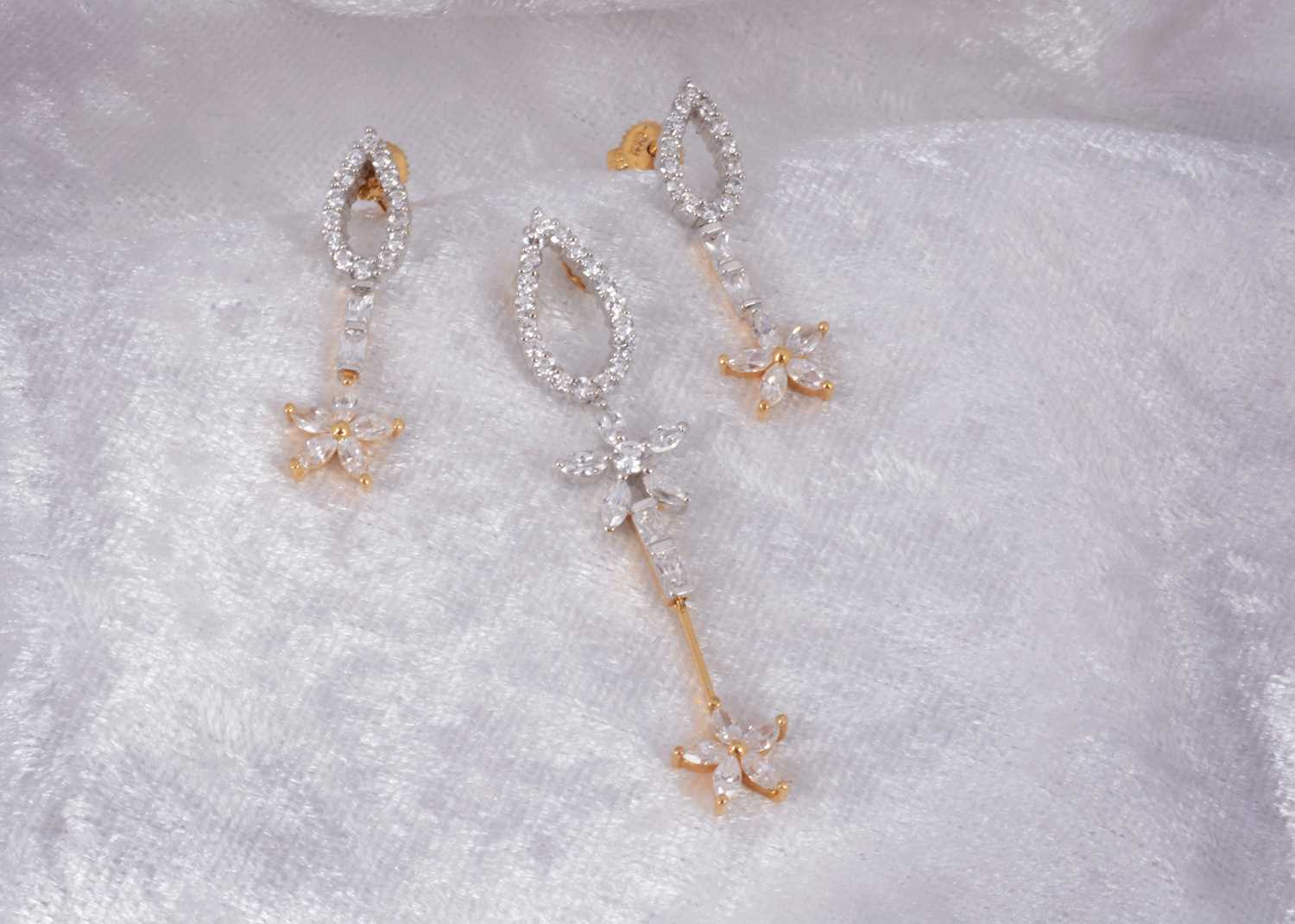 Lot 75 - A continental cubic zirconia two colour pendant and earring set