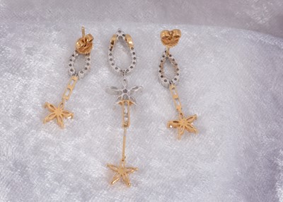 Lot 75 - A continental cubic zirconia two colour pendant and earring set