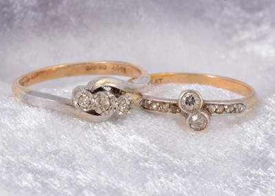 Lot 80 - An 18ct gold diamond and platinum three stone dress ring