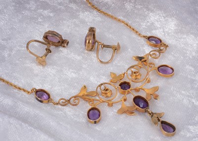 Lot 85 - An Edwardian 9ct gold amethyst and seed pearl necklace