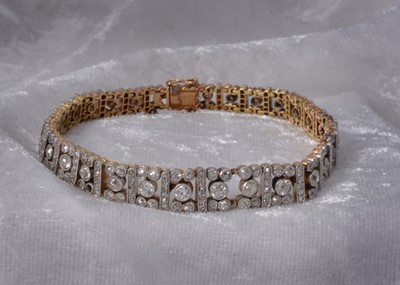 Lot 86 - An art deco old cut diamond line bracelet