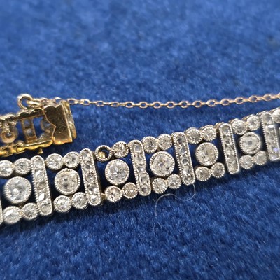 Lot 86 - An art deco old cut diamond line bracelet