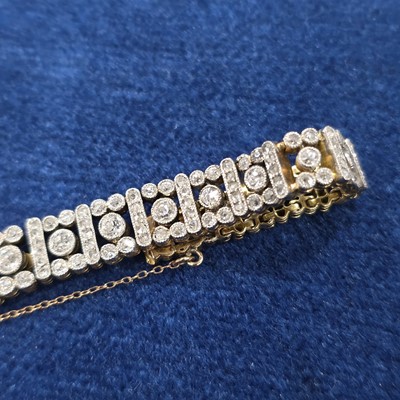 Lot 86 - An art deco old cut diamond line bracelet