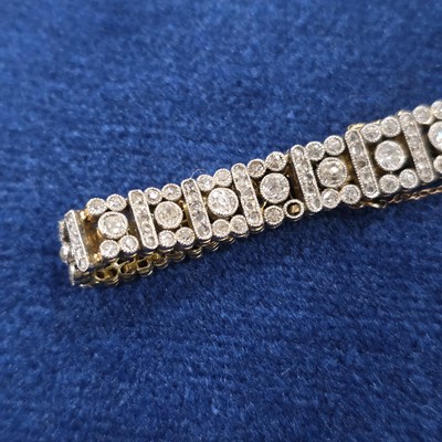 Lot 86 - An art deco old cut diamond line bracelet
