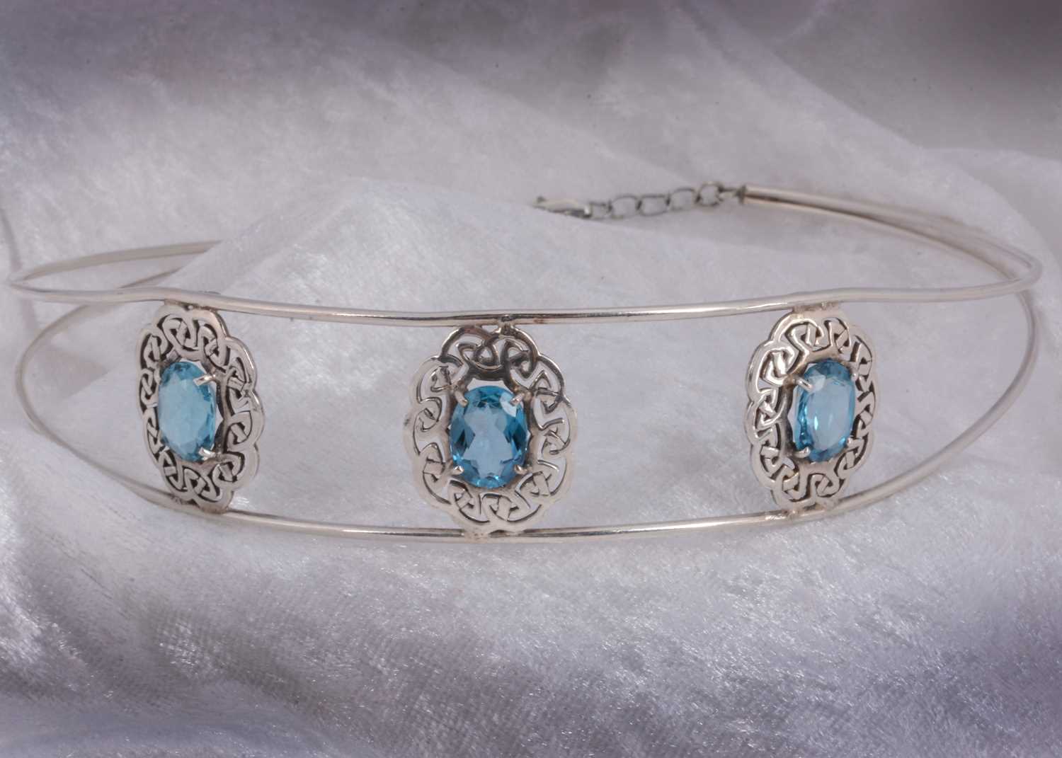 Lot 92 - A Celtic topaz set neck collar