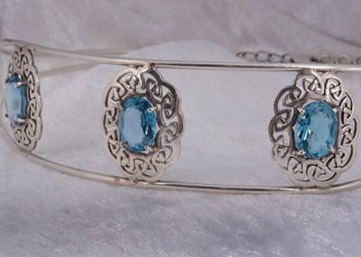 Lot 92 - A Celtic topaz set neck collar
