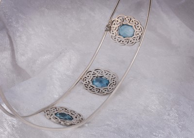 Lot 92 - A Celtic topaz set neck collar